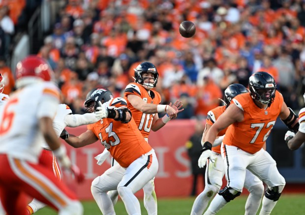 Bo Nix (10) of the Denver Broncos passes the ball down the field against the Kansas City Chiefs at Empower Field at Mile High on Nov. 16, 2025. (Photo by RJ Sangosti/The Denver Post)