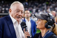 Dallas Cowboys owner Jerry Jones speaks with Dallas Cowboys sideline reporter Kristi Scales...