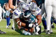Dallas Cowboys defensive end Marshawn Kneeland (94) and defensive tackle Solomon Thomas (90)...