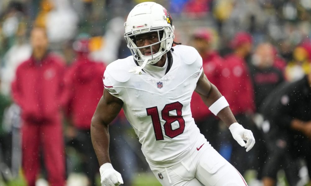 Oct 13, 2024; Green Bay, Wisconsin, USA; Arizona Cardinals wide receiver Marvin Harrison Jr. (18) during warmups prior to the game against the Green Bay Packers at Lambeau Field. Mandatory Credit: Jeff Hanisch-Imagn Images
