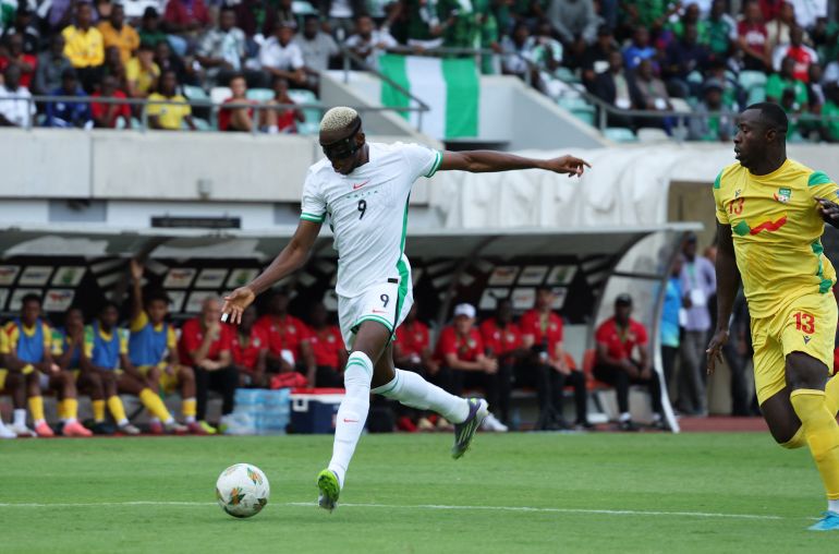 Nigeria's Victor Osimhen scores their first goal
