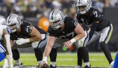 Raiders quarterback Geno Smith (7) sets up to receive the snap from center Will Putnam (67) wit ...