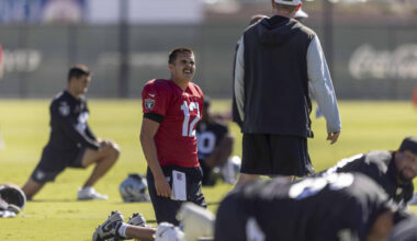 Raiders quarterback Aidan O'Connell (12) stretches during the team’s practice at th ...
