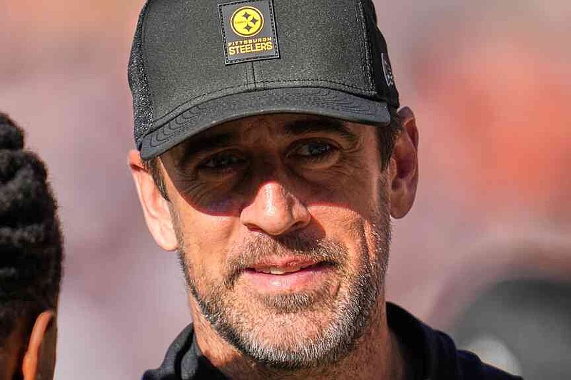 Pittsburgh Steelers quarterback Aaron Rodgers stands on the sidelines during the first half of an NFL football game against the Chicago Bears, Sunday, Nov. 23, 2025, in Chicago. (AP Photo/Erin Hooley)