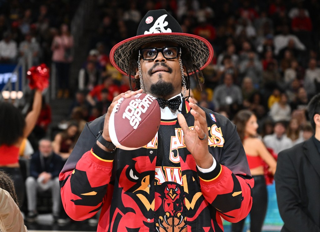 Former NFL Player Cam Newton attends the game between the Los Angeles Lakers and the Atlanta Hawks at State Farm Arena on November 08, 2025 in Atlanta, Georgia. 