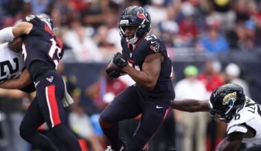 Houston Texans running back Nick Chubb (21) runs with the ball.