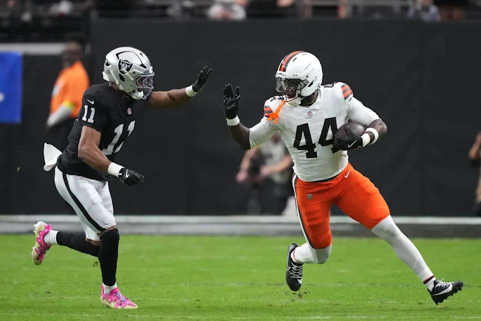 Nov 23, 2025; Paradise, Nevada, USA; Cleveland Browns tight end Harold Fannin Jr. (44) runs against Las Vegas Raiders safety Jeremy Chinn (11) in the first half at Allegiant Stadium. Mandatory Credit: Kirby Lee-Imagn Images