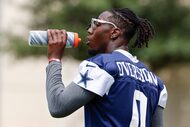Dallas Cowboys linebacker DeMarvion Overshown (0) drinks water during practice at The Star,...