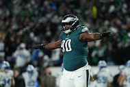 Philadelphia Eagles defensive tackle Jordan Davis (90) reacts after a Detroit Lions turn...