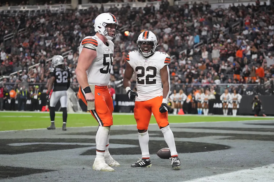 Nov 23, 2025; Paradise, Nevada, USA; Cleveland Browns running back Dylan Sampson (22) celebrates with center Ethan Pocic (55) after scoring in the second half at Allegiant Stadium. Mandatory Credit: Kirby Lee-Imagn Images