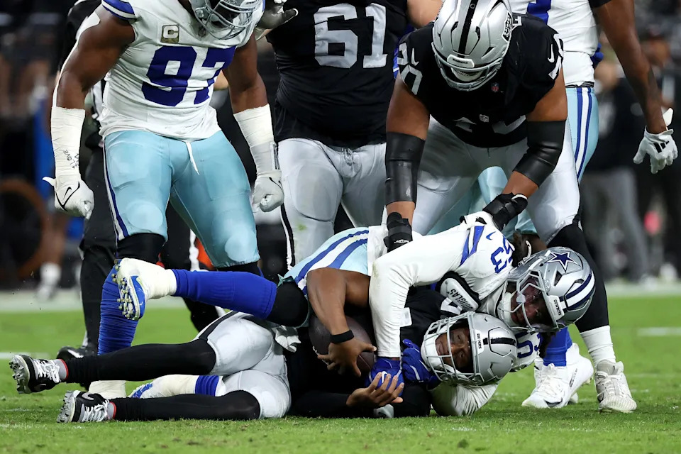 LAS VEGAS, NEVADA - NOVEMBER 17: James Houston #53 of the Dallas Cowboys sacks Geno Smith #7 of the Las Vegas Raiders during the first quarter at Allegiant Stadium on November 17, 2025 in Las Vegas, Nevada. (Photo by Ian Maule/Getty Images)
