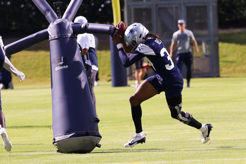 Dallas Cowboys cornerback Shavon Revel Jr. (34) ran with the ball during Cowboys practice at...