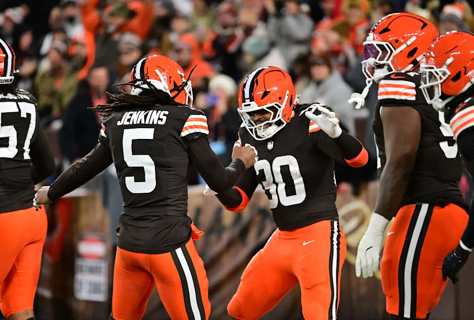Nov 16, 2025; Cleveland, Ohio, USA; Cleveland Browns linebacker Devin Bush (30) celebrates with safety Rayshawn Jenkins (5) after returning an interception for a touchdown during the second quarter against the Baltimore Ravens at Huntington Bank Field. Mandatory Credit: Ken Blaze-Imagn Images