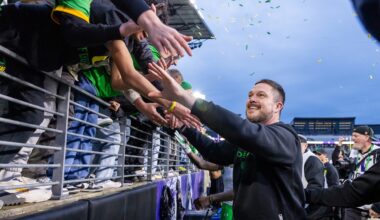 Oregon defeats Washington 26-14, secures College Football Playoff berth