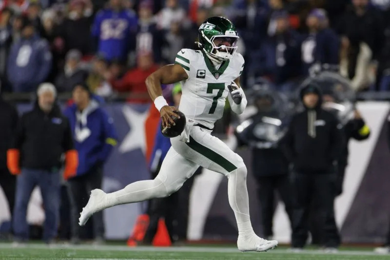 New York Jets quarterback Justin Fields runs with the ball against the New England Patriots on Thursday at Gillette Stadium in Foxborough, Mass. Photo by CJ Gunther/UPI