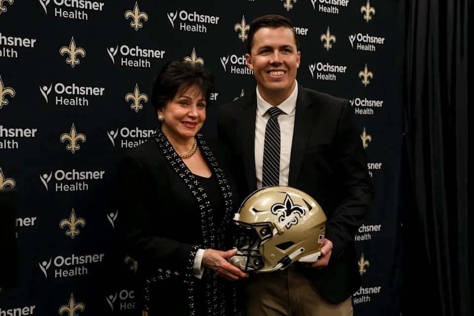 METAIRIE, LOUISIANA - FEBRUARY 13: Newly named head coach Kellen Moore of the New Orleans Saints poses with owner Gayle Benson following a introductory press conference at the Ochsner Sports Performance Center on February 13, 2025 in Metairie, Louisiana. (Photo by Derick E. Hingle/Getty Images)Derick E. Hingle/Getty Images