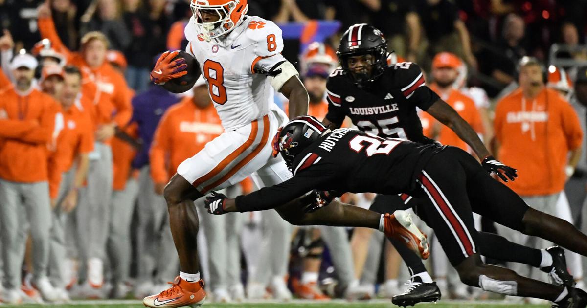 Clemson sneaks past Louisville 20-19 despite botched punt snap and goal-line stand | Football