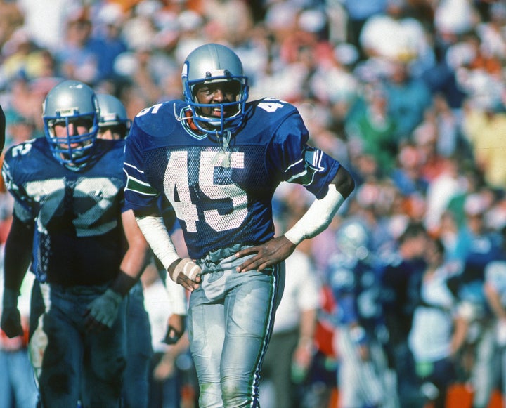 Kenny Easley #45 of the Seattle Seahawks looks on from the field during a playoff game against the Miami Dolphins at the Orange Bowl on December 29, 1984 in Miami, Florida. (Photo by George Gojkovich/Getty Images)