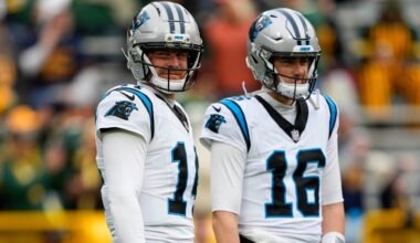 QB Mike White released, rookie DL signed