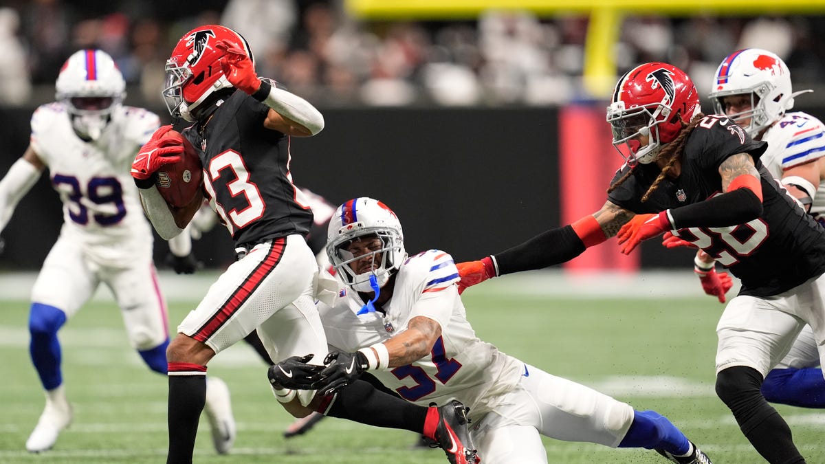 Deven Thompkins elevated, Khalid Kareem signed