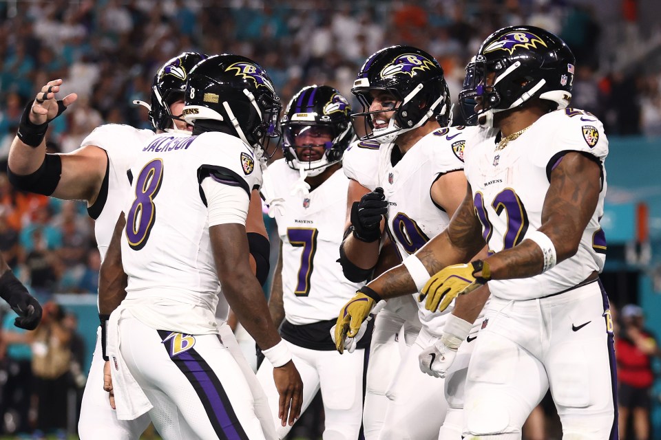 Mark Andrews #89 of the Baltimore Ravens celebrates with Lamar Jackson #8 after scoring a 2 yard touchdown against the Miami Dolphins