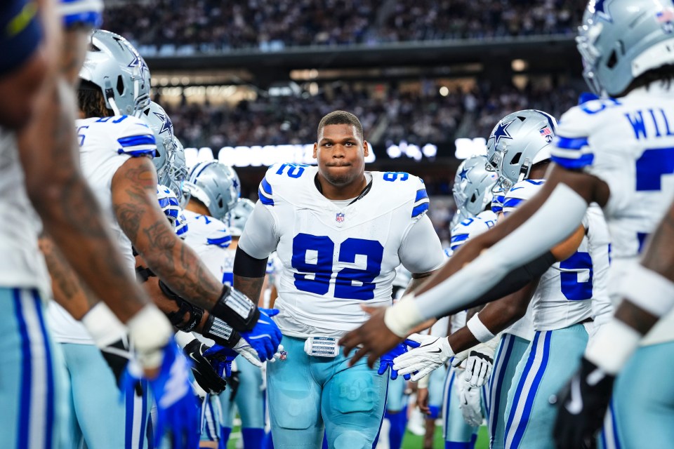 Quinnen Williams #92 of the Dallas Cowboys runs out of the tunnel prior to an NFL football game against the Philadelphia Eagles at AT&T Stadium on November 23, 2025 in Arlington, Texas.