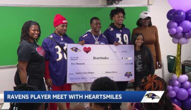 Ravens present check to nonprofit focusing on mentorship of youth