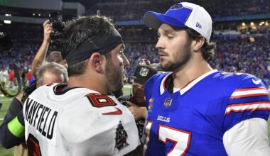 Tampa Bay Buccaneers quarterback Baker Mayfield, left, and Buffalo Bills quarterback Josh Allen, right, talk following their NFL football game, Thursday, Oct. 26, 2023, in Orchard Park, N.Y. (AP Photo/Adrian Kraus)