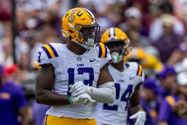 LSU defensive end Bradyn Swinson takes the field against Mississippi State during the first half of an NCAA game on Saturday, Sept. 16, 2023, in Starkville, Miss. (AP Photo/Vasha Hunt)