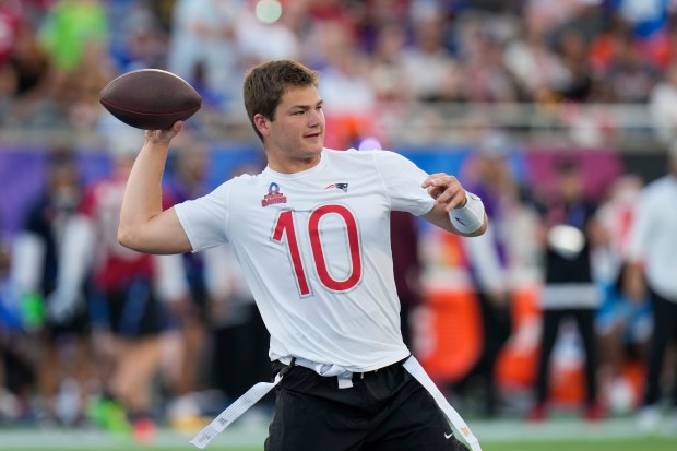 AFC quarterback Drake Maye, of the New England Patriots, passes during the flag football event at the NFL Pro Bowl, Sunday, Feb. 2, 2025, in Orlando. (AP Photo/Chris O'Meara)