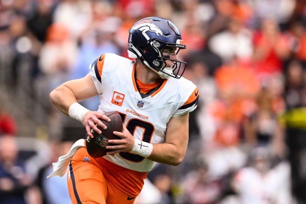 Denver Broncos quarterback Bo Nix (10) looks to pass the ball during the second quarter of an NFL football game against the Houston Texans, Nov. 2, 2025, in Houston. (AP Photo/Maria Lysaker)