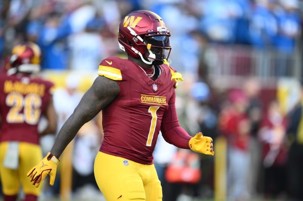 Washington Commanders wide receiver Deebo Samuel (1) warms up before an NFL football game against the Detroit Lions, Sunday, Nov. 9, 2025, in Landover, Md. (AP Photo/Nick Wass)