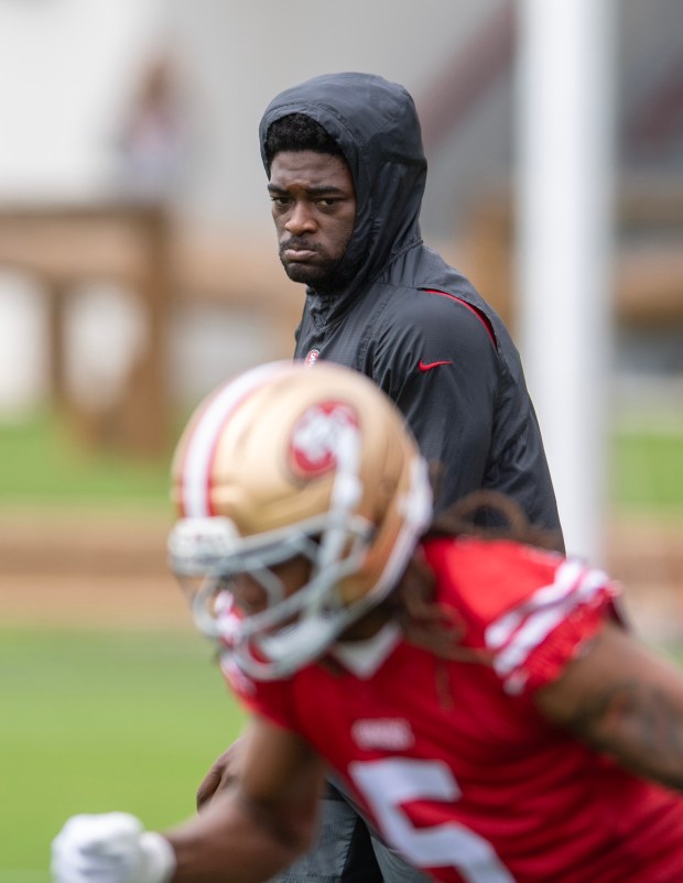San Francisco 49ers' Brandon Aiyuk watches teammates during practice at the 49ers training camp at the practice facility at Levi's Stadium in Santa Clara, Calif., on Thursday, July 24, 2025. (Doug Duran/Bay Area News Group)