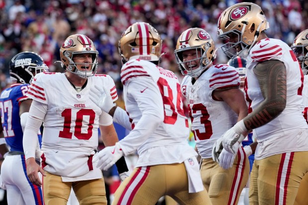San Francisco 49ers quarterback Mac Jones (10) reacts after a touchdown against the New York Giants during the second half of an NFL football game, Sunday, Nov. 2, 2025, in East Rutherford, N.J. (AP Photo/Seth Wenig)