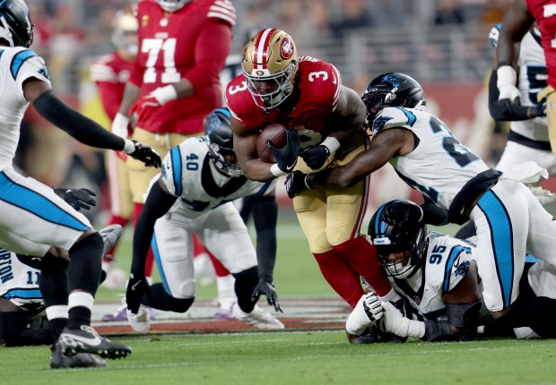 San Francisco 49ers' Brian Robinson Jr. #3 carries against the Carolina Panthers in the first quarter of their NFL game at Levi's Stadium in Santa Clara, Calif., on Monday, Nov. 24, 2025. (Jane Tyska/Bay Area News Group)
