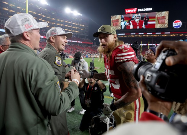 San Francisco 49ers' George Kittle #85 celebrates with Air Force fans after their NFL win over the Carolina Panthers at Levi's Stadium in Santa Clara, Calif., on Monday, Nov. 24, 2025. (Jane Tyska/Bay Area News Group)