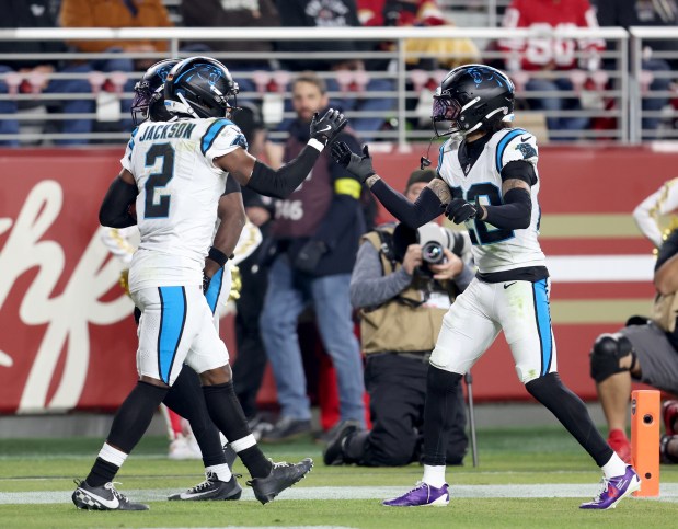 Carolina Panthers' Mike Jackson #2 and Lathan Ransom #22 celebrate an interception in the second quarter of their NFL game against the San Francisco 49ers at Levi's Stadium in Santa Clara, Calif., on Monday, Nov. 24, 2025. (Jane Tyska/Bay Area News Group)