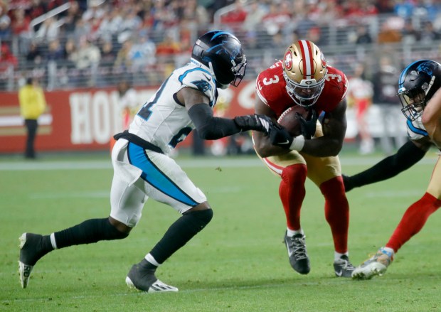 San Francisco 49ers' Brian Robinson Jr. #3 carries for yardage in the fourth quarter of their NFL game against the Carolina Panthers at Levi's Stadium in Santa Clara, Calif., on Monday, Nov. 24, 2025. (Jane Tyska/Bay Area News Group)