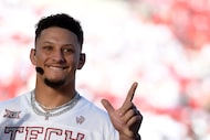 Kansas City Chiefs quarterback Patrick Mahomes, who played at Texas Tech, gestures before...