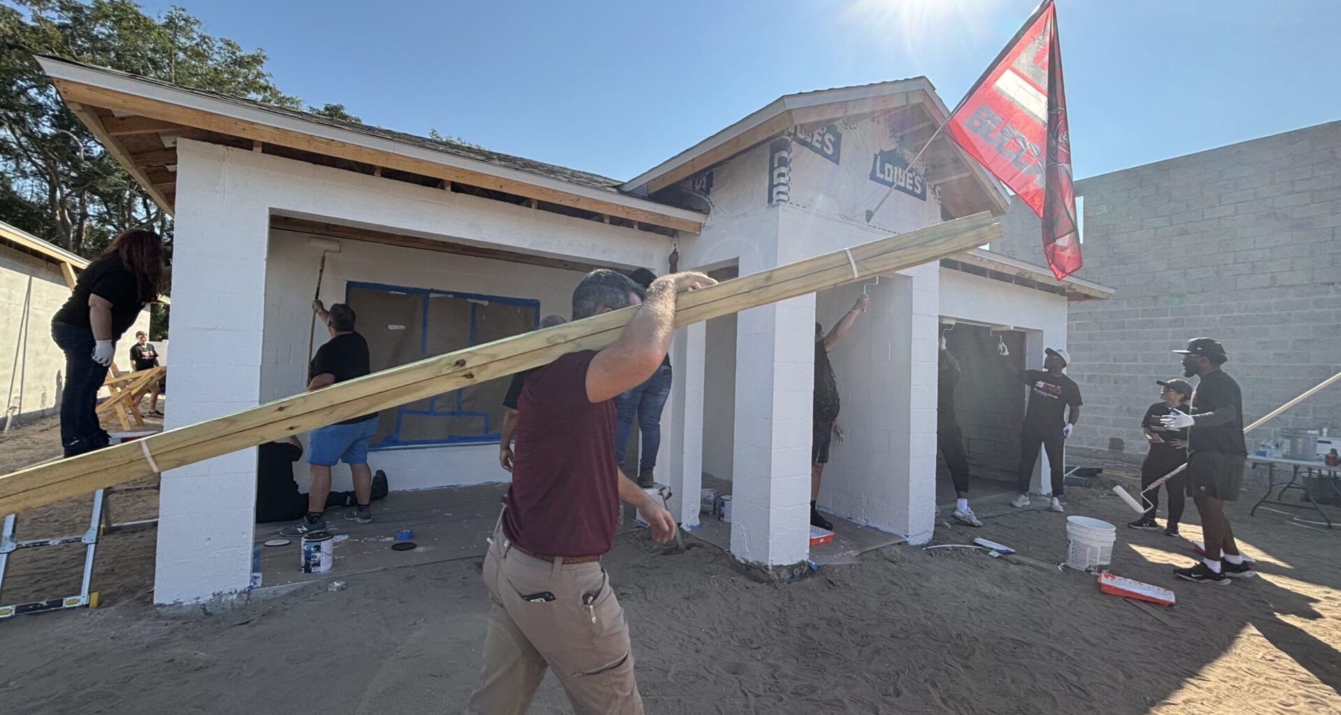 Tampa Bay Bucs players and personnel join in Habitat home building for the holidays