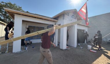 Tampa Bay Bucs players and personnel join in Habitat home building for the holidays