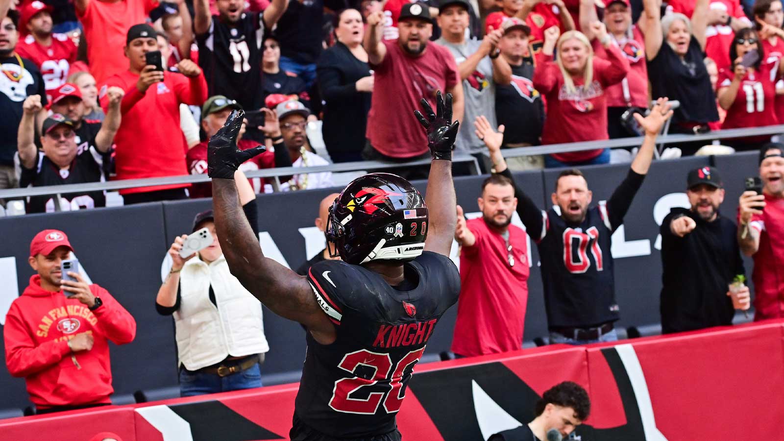 Arizona Cardinals running back Bam Knight (20) celebrates a touchdown in the first quarter against the San Francisco 49ers at Mercedes-Benz Stadium. 