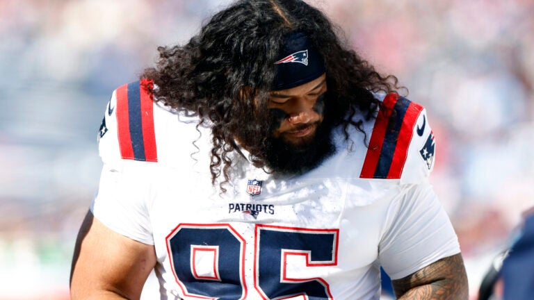 New England Patriots defensive tackle Khyiris Tonga (95) on the sideline during the fourth quarter at Nissan Stadium on Oct. 19, 2025.