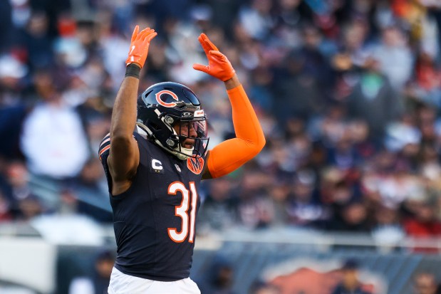 Bears safety Kevin Byard III raises his arms to the crowd during the fourth quarter against the Steelers on Sunday, Nov. 23, 2025, at Soldier Field. (Eileen T. Meslar/Chicago Tribune)