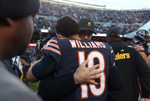 Steelers quarterback Aaron Rodgers hugs Bears quarterback Caleb Williams after a 31-28 Bears win Sunday, Nov. 23, 2025, at Soldier Field. (John J. Kim/Chicago Tribune)