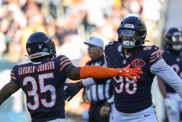 Bears defensive end Montez Sweat (98) celebrates after a sack and fumble recovery in the third quarter against the Steelers on Sunday, Nov. 23, 2025, at Soldier Field. (John J. Kim/Chicago Tribune)