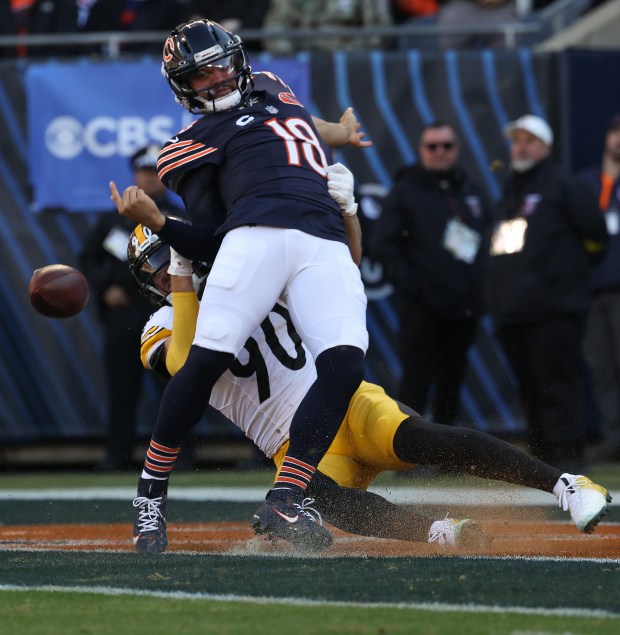 Steelers linebacker T.J. Watt sacks Bears quarterback Caleb Williams in the end zone, resulting in a fumble and a Steelers recovery for a touchdown, in the second quarter Sunday, Nov. 23, 2025, at Soldier Field. (John J. Kim/Chicago Tribune)