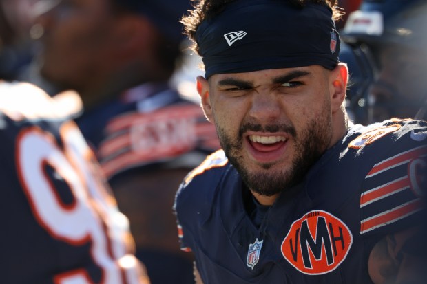 Bears defensive end Austin Booker sits on the sideline after a turnover on downs in the second quarter against the Steelers on Sunday, Nov. 23, 2025, at Soldier Field. (John J. Kim/Chicago Tribune)