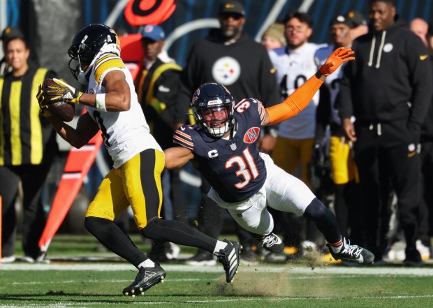 Steelers wide receiver Calvin Austin III eludes Bears safety Kevin Byard III in the first quarter Sunday, Nov. 23, 2025, at Soldier Field. (John J. Kim/Chicago Tribune)