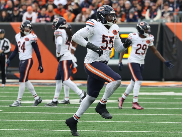Bears defensive end Dayo Odeyingbo hops off the field on...